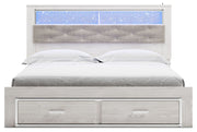Altyra - White - King Upholstered Bookcase Bed With Storage - JaxCo Furniture