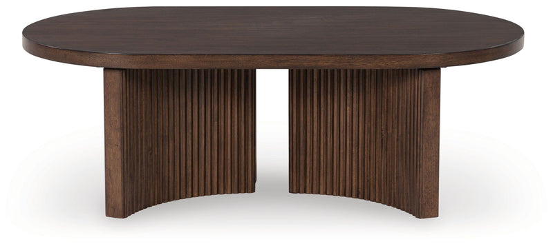 Korestone - Dark Brown - Oval Cocktail Table - JaxCo Furniture
