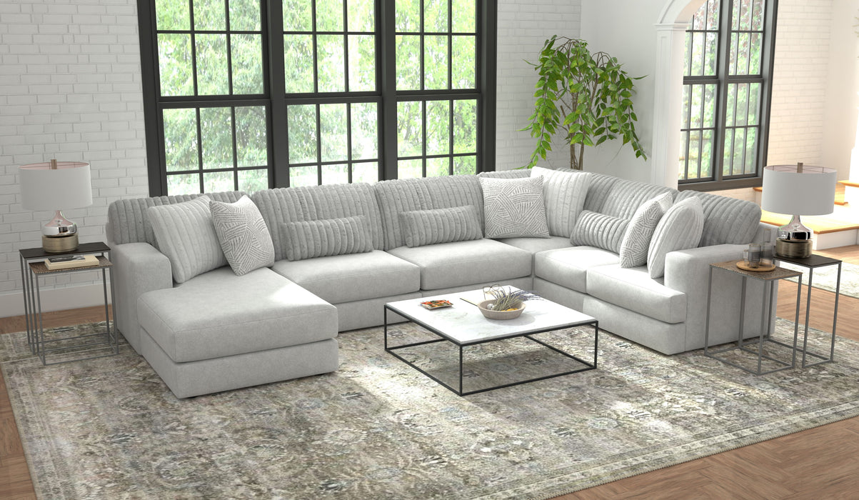 Logan - Sectional With Comfort Coil Seating And Included Accent Pillows - JaxCo Furniture