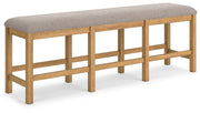 Havonplane - Brown - XL Counter Height Upholstered Dining Bench - JaxCo Furniture