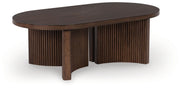 Korestone - Dark Brown - Oval Cocktail Table - JaxCo Furniture