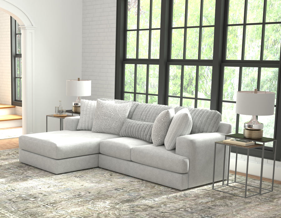 Logan - Sectional With Comfort Coil Seating And Included Accent Pillows - JaxCo Furniture