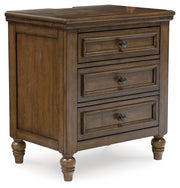 Sturlayne - Brown - Three Drawer Night Stand - JaxCo Furniture