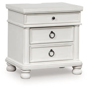 Rowlenstown - Three Drawer Night Stand - JaxCo Furniture