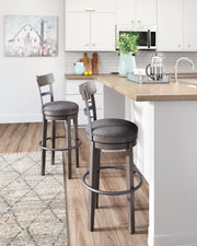 Caitbrook - Gray - Tall UPH Swivel Barstool - JaxCo Furniture