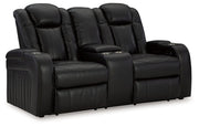 Caveman Den - Midnight - Power Reclining Loveseat with Console/ Adj Hdrst - JaxCo Furniture