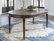 Lavinton - Brown - Oval Dining Room Extension Table - JaxCo Furniture