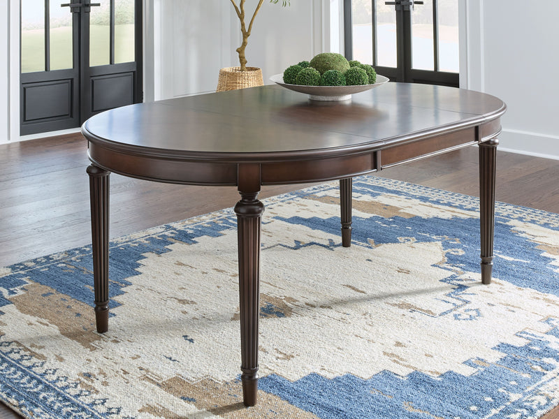 Lavinton - Brown - Oval Dining Room Extension Table - JaxCo Furniture