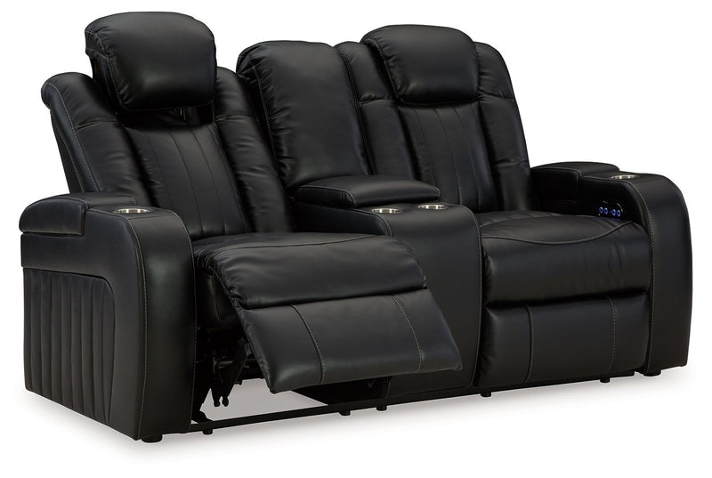 Caveman Den - Midnight - Power Reclining Loveseat with Console/ Adj Hdrst - JaxCo Furniture