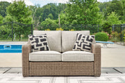 Beachcroft - Beige - Loveseat With Cushion - JaxCo Furniture