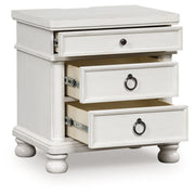 Rowlenstown - Three Drawer Night Stand - JaxCo Furniture