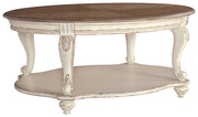 Realyn - White / Brown - Oval Cocktail Table - JaxCo Furniture