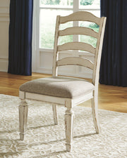 Realyn - Chipped White - Dining UPH Side Chair (Set of 2) - Ladderback - JaxCo Furniture